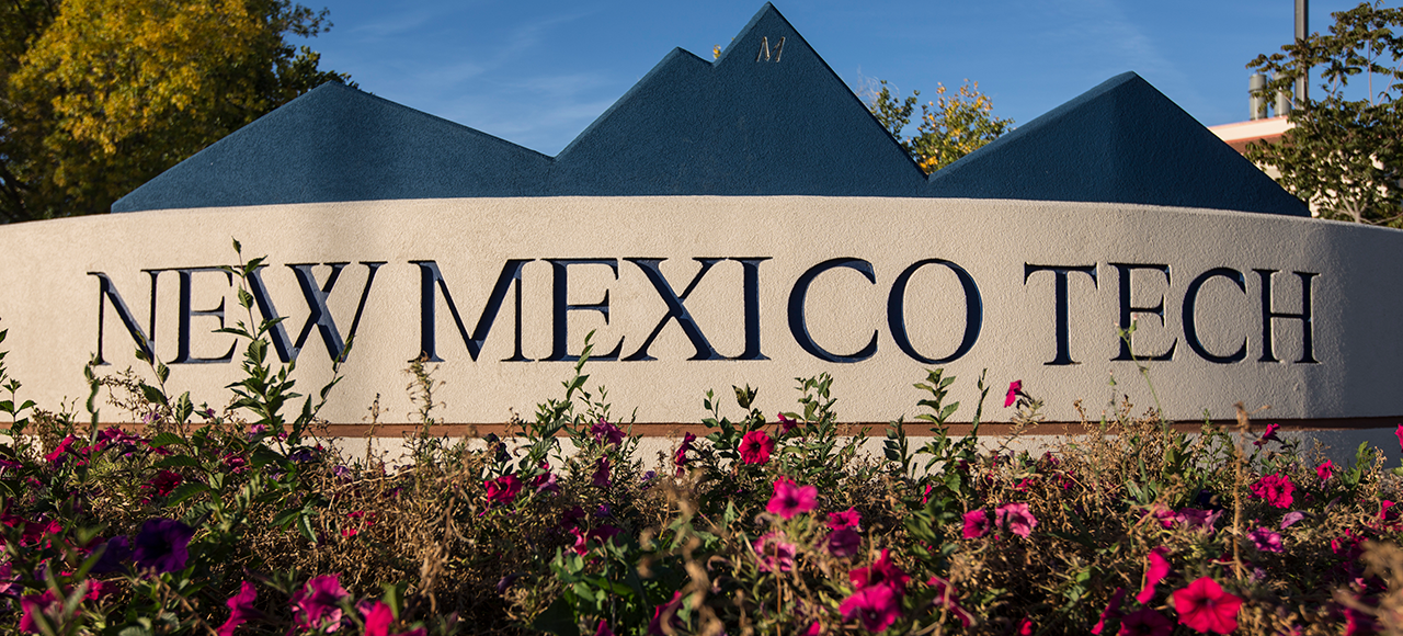 Image of the New Mexico Tech sign at the Bureau of Geology pong.