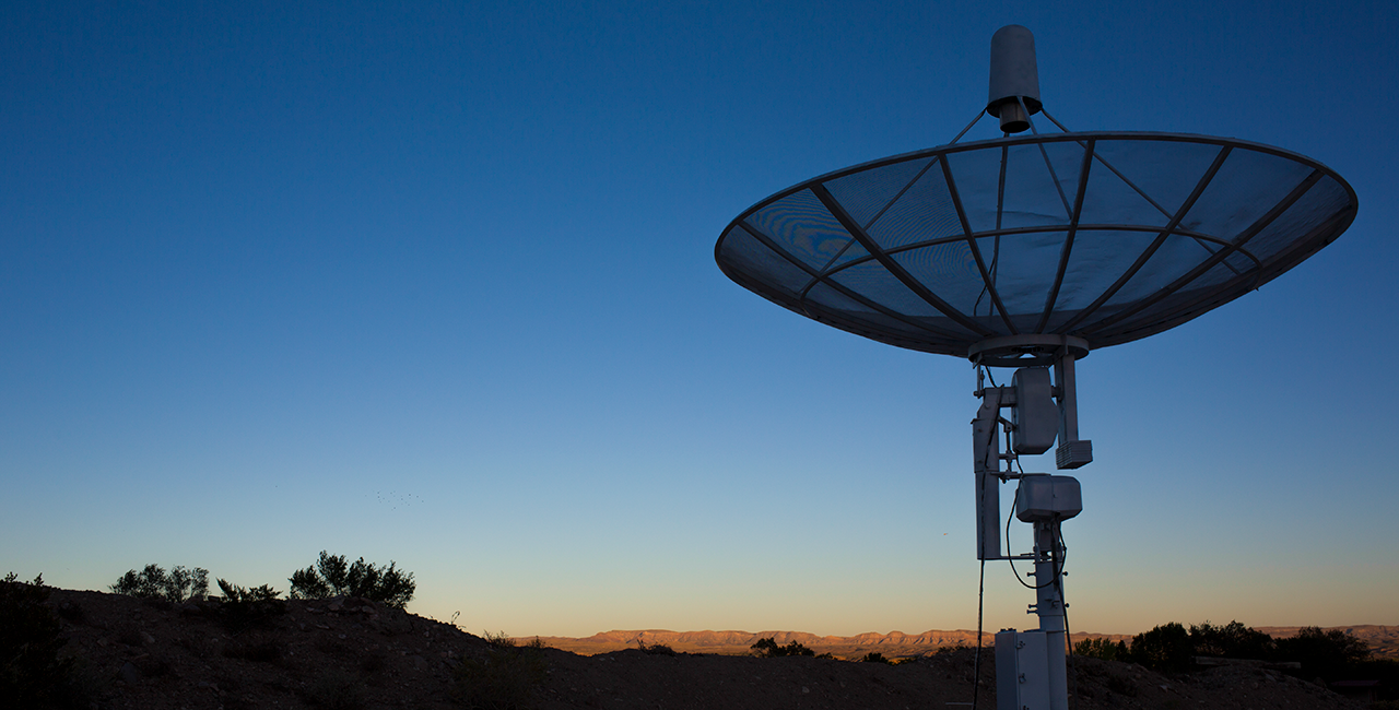 Image of radio satellite dish at sunset