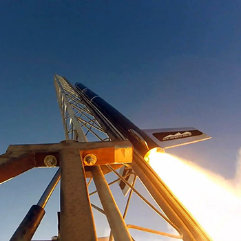 Image of rocket launching from pad