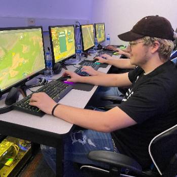 A student from Socorro High School sits at a computer and works on training exercises for “League of Legends” in the esports lab at New Mexico Tech.