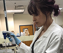 Angelica Cave working in her biology lab at NMT