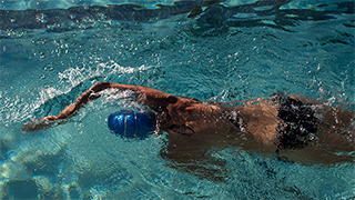 An image of a swimmer in a swim lane.