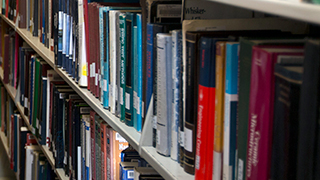 Library publications on a bookshelf