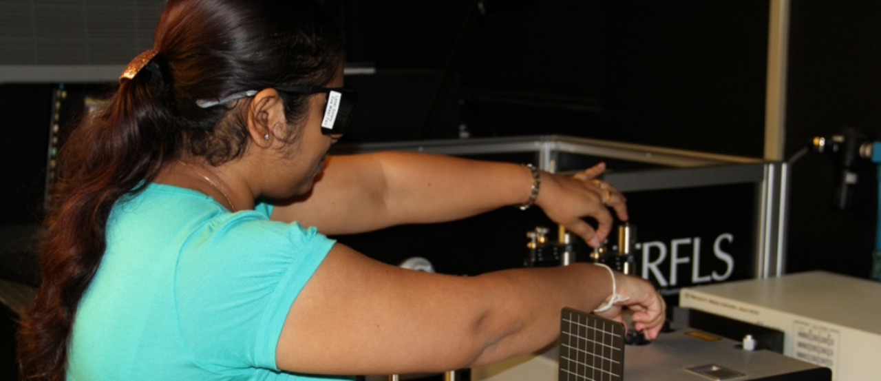 Image of female student working on research.