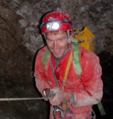 Image of Dr. Daniel Jones in a cave