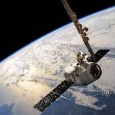 Satellite in orbit around the Earth, with a portion of the Earth visible below
