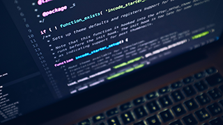 multiple lines of code listed horizontally across a laptop screen