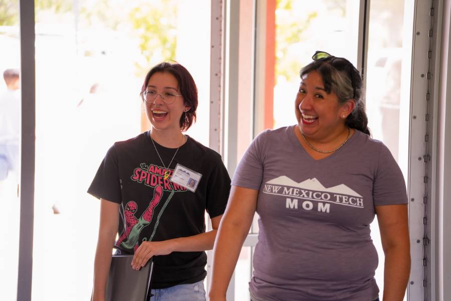 Mom and daughter step into the dorm