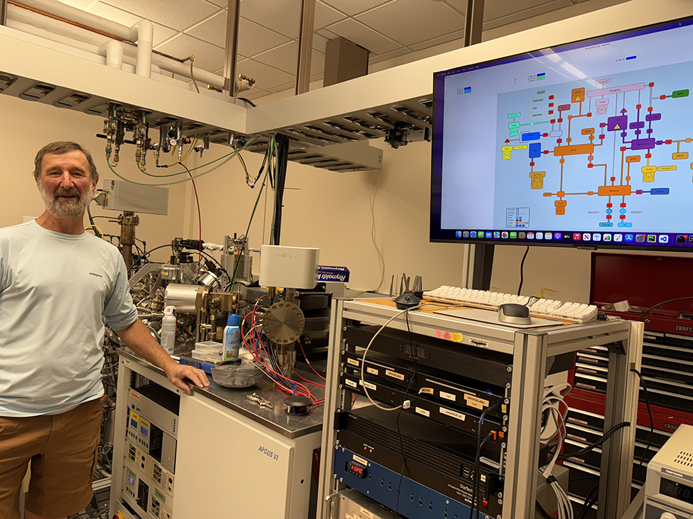 Matthew Heizler, a New Mexico Tech emeritus researcher and former director for the New Mexico Geochronology Research Laboratory at the New Mexico Bureau of Geology, in the Argon Geochronology Lab on campus where the dating of the samples occurred.