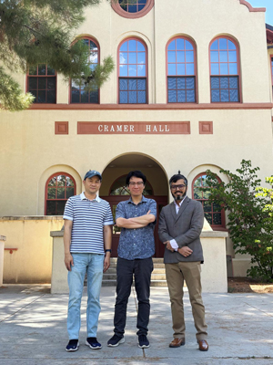 Dr. Jun Zheng, Dr. Jiakai Zhang, and Dr. Suraj Ghimire in front of Cramer Hall.