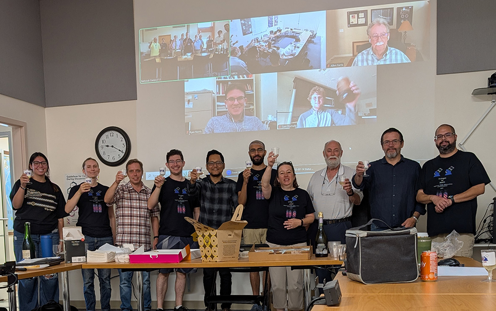 MROI team at NM Tech and Cambridge (on Zoom) toasting first fringes in July, 2025.