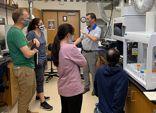 Bureau lab staff and scientists during the OEM installation