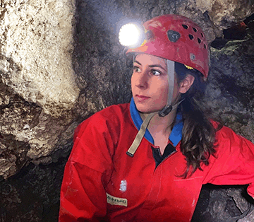 Zoe Havlena in caving gear