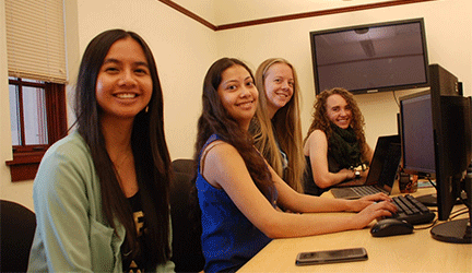 Four NMT women students in computer science