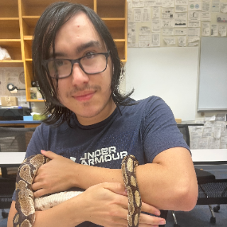 Kevin photo holding a snake